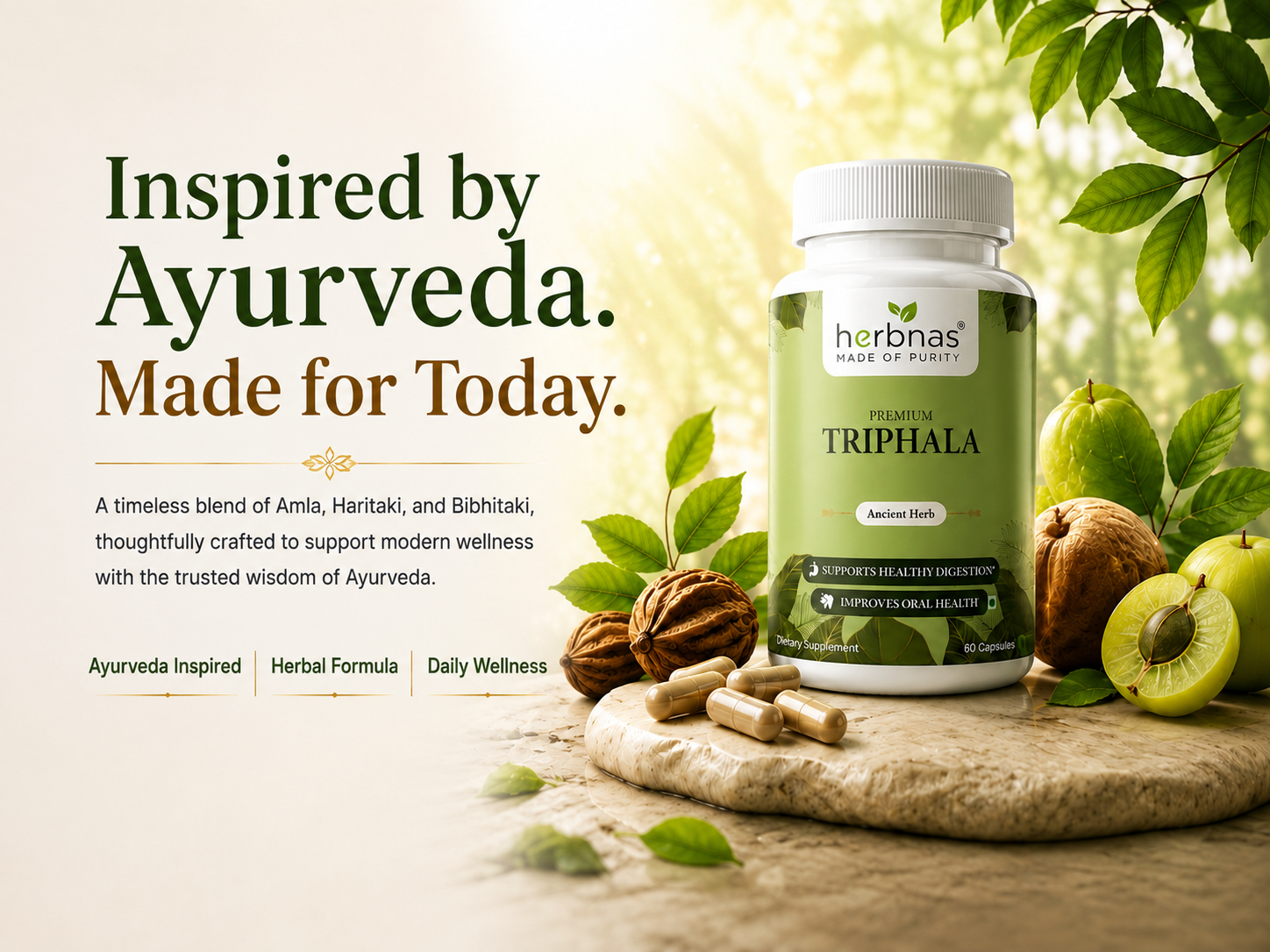 A bottle of Herbnas Premium Triphala herbal supplement with capsules, styled on a wooden board with walnuts, green fruits, and leaves against a warm, sunlit background with text reading 'Inspired by Ayurveda. Made for Today.