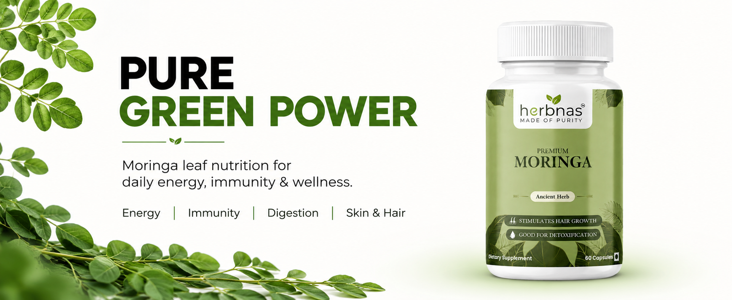 Herbnas Moringa supplement bottle with green leaves on a white background