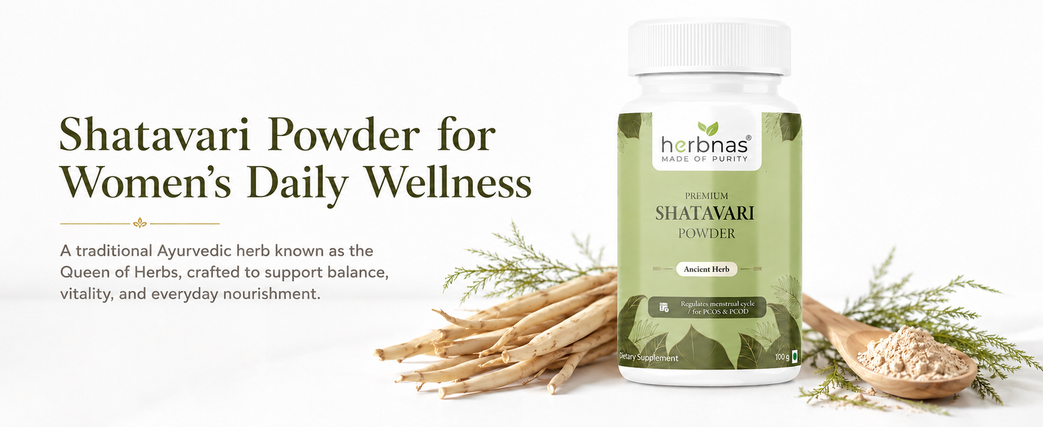 Bottle of Shatavari powder with herbs and a scoop on a white background